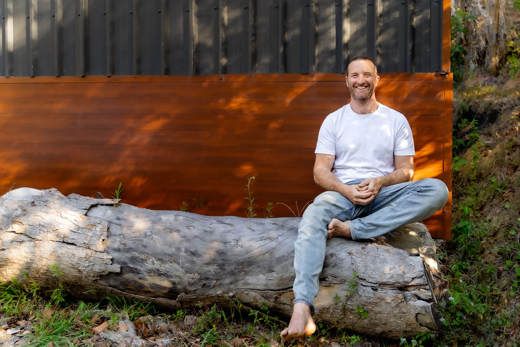 Rich Muir laughing at his Currumbin Valley property