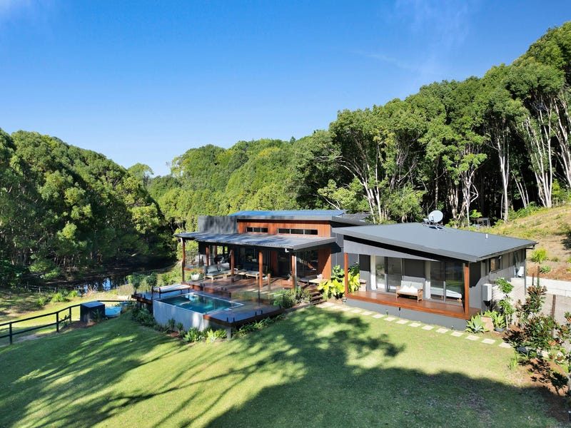 The house tucked into forested hills in Currumbin Valley