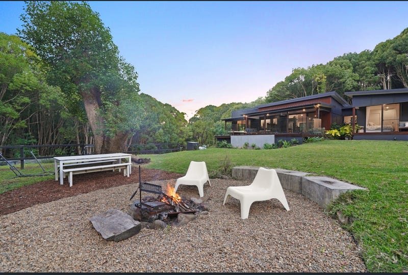Fire pit on the lawn at dusk in Currumbin Valley